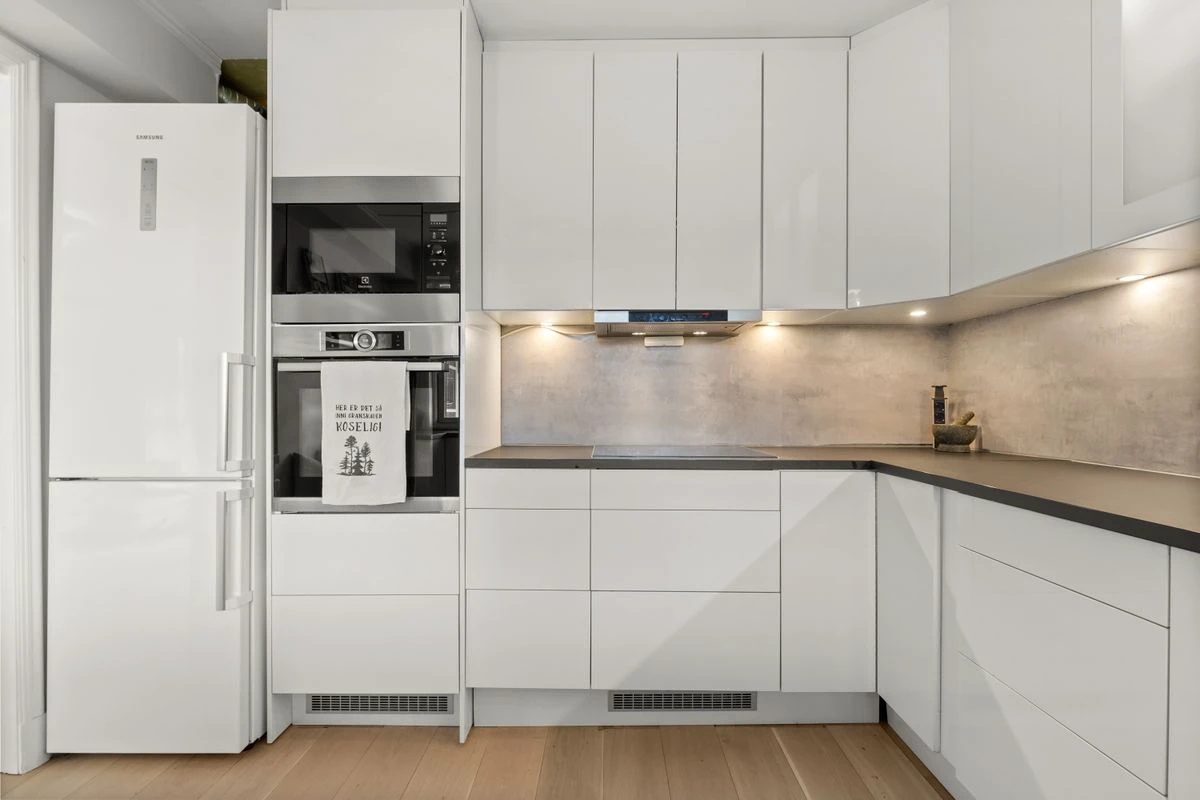 Pre-assembled kitchen cabinets installed in a bright kitchen